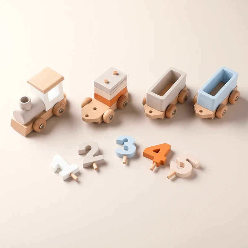 Wooden toy train set with detachable number blocks and pastel colored train cars